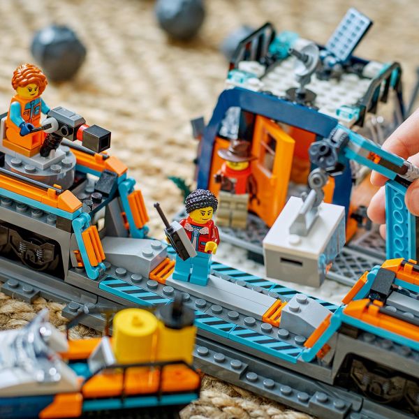 Plan expeditions and crane items onto the train at the outpost building.