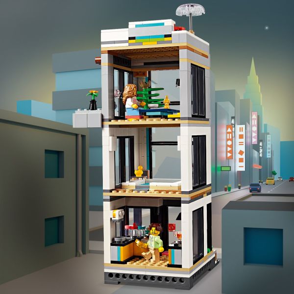 3-story building has a hot tub room and rooftop terrace.