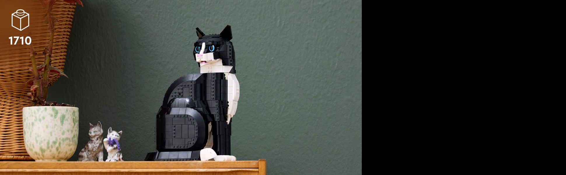 Indulge your passion for animals, art and design and create striking home decor with this buildable tuxedo cat statue.